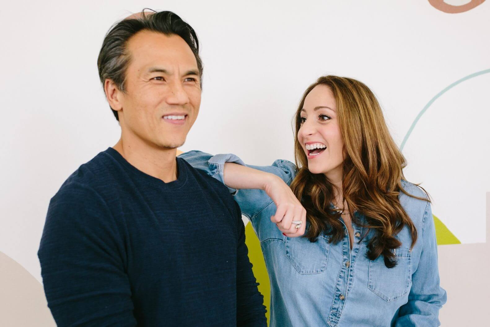 John Kim and Noelle Cordeaux laughing