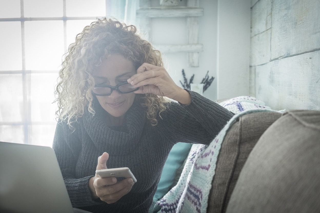 Woman looking at her smartphone