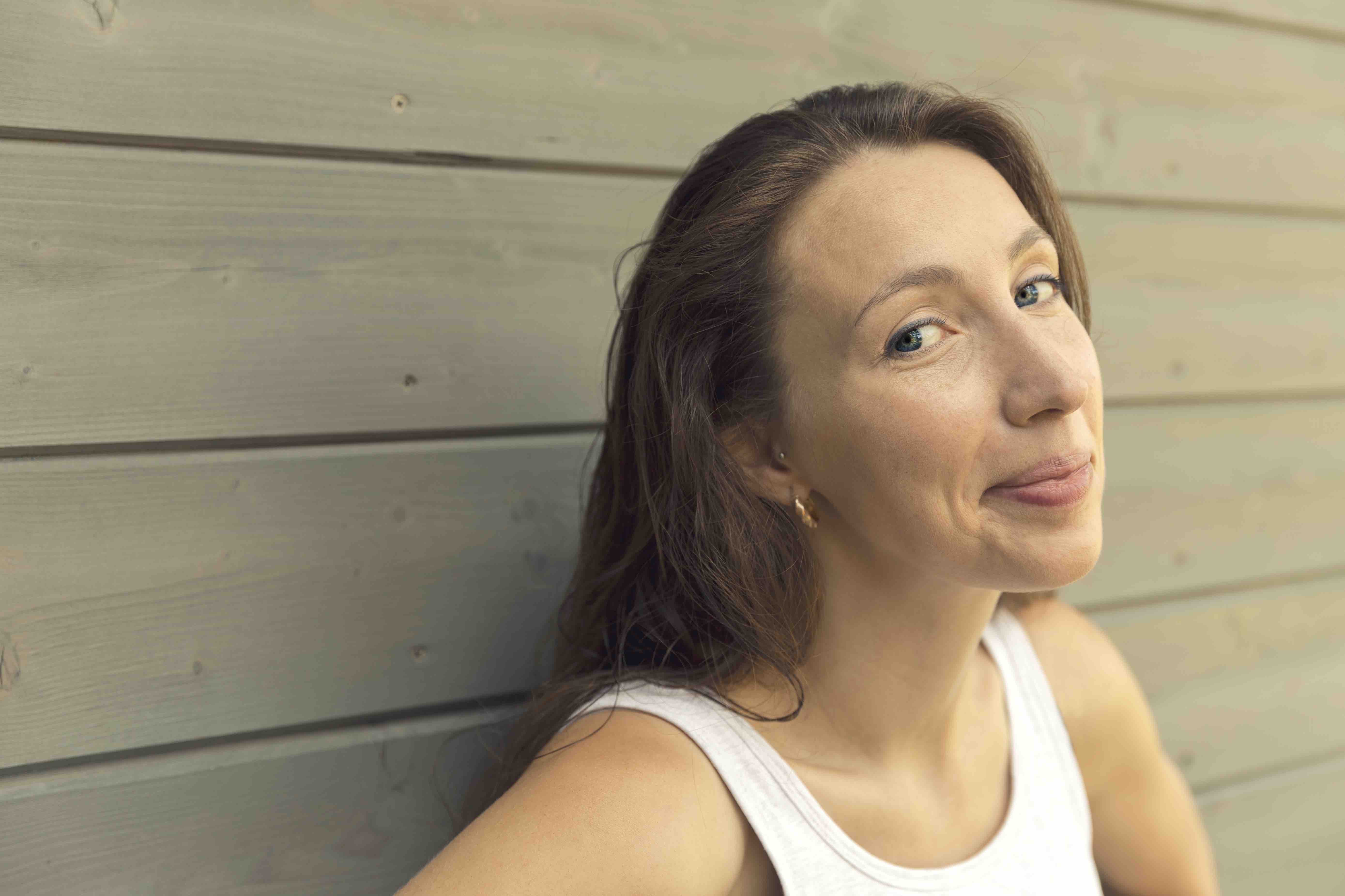 Woman looking curiously at the camera